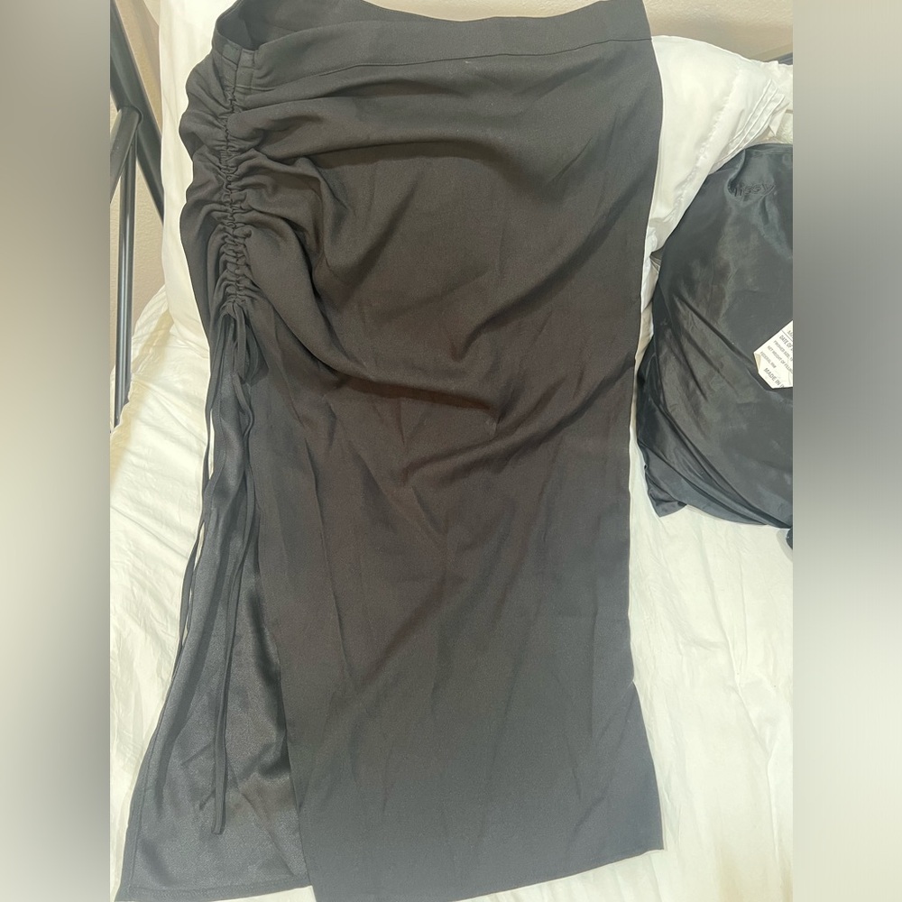 Black skirt with high slit
